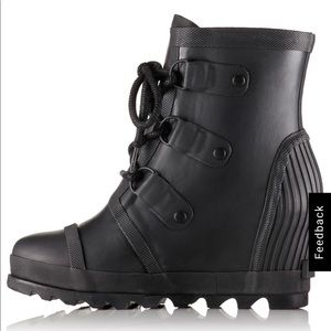 Black Sorel wedge rain boots